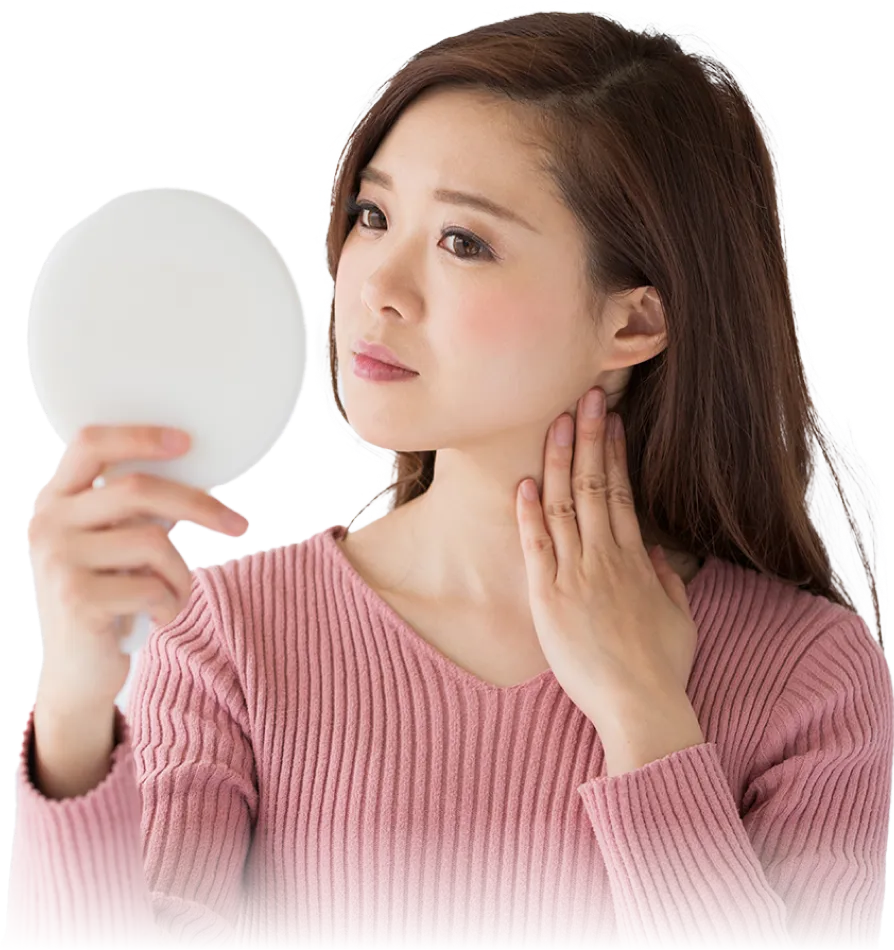 顔の悩みを持つ女性